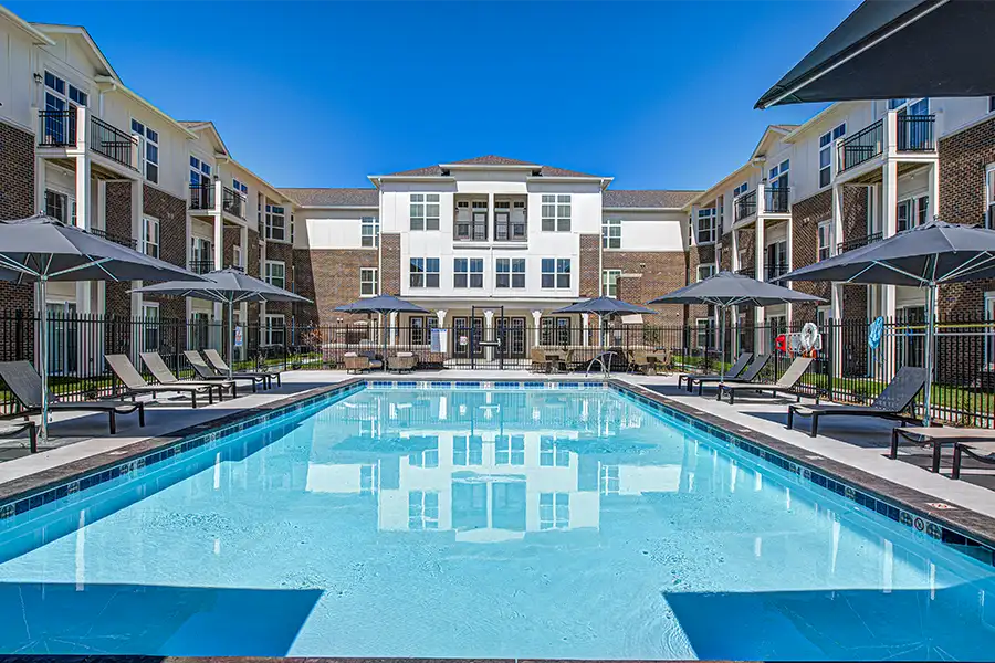 Not sure what a community means by amenities? This pool at Highpointe Apartments is one example of an amenity. Pristine pool surrounded by apartment buildings at Highpointe Apartments.